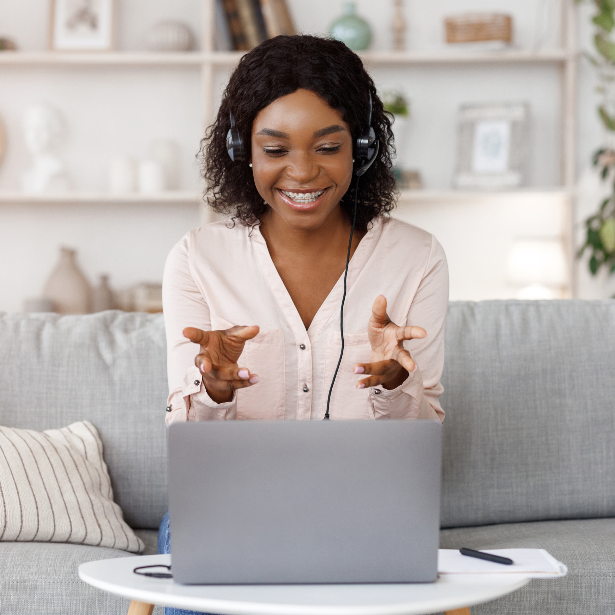 Woman in a headset turning online